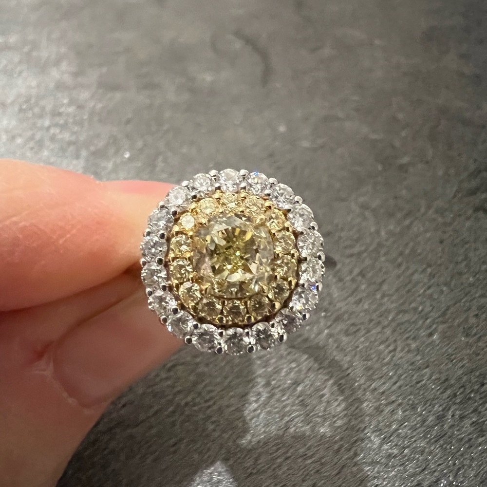 1.09ct yellow diamond solitaire with yellow and white diamond halo ring